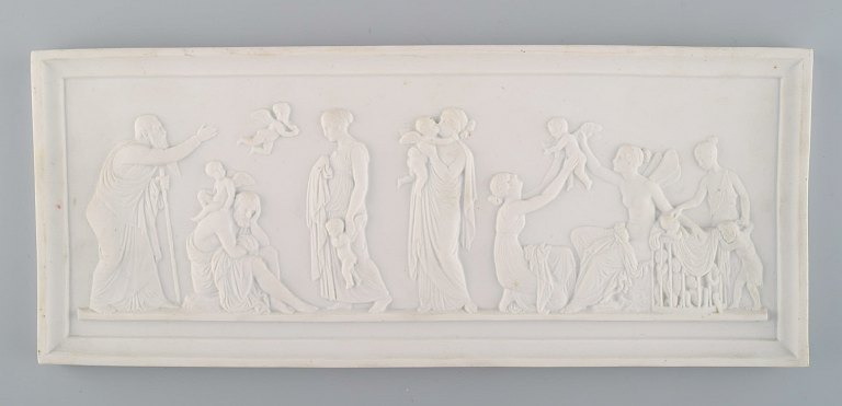 Royal Copenhagen after Thorvaldsen. Antique biscuit wall plaque. The ages of 
Love # 115. Dated 1860-80.
