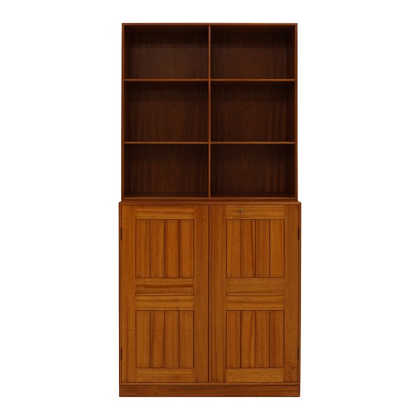 A Mogens Koch mahogany bookcase made by Rud. Rasmussen, Denmark. H: 157cm