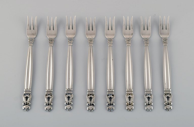 Eight Georg Jensen Acorn oyster forks in sterling silver.
