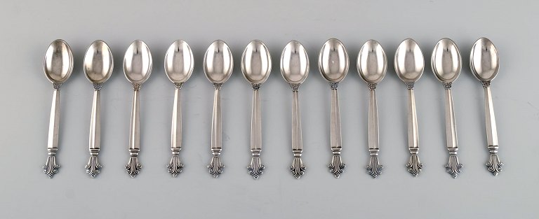 Twelve Georg Jensen Acorn teaspoons in sterling silver.
