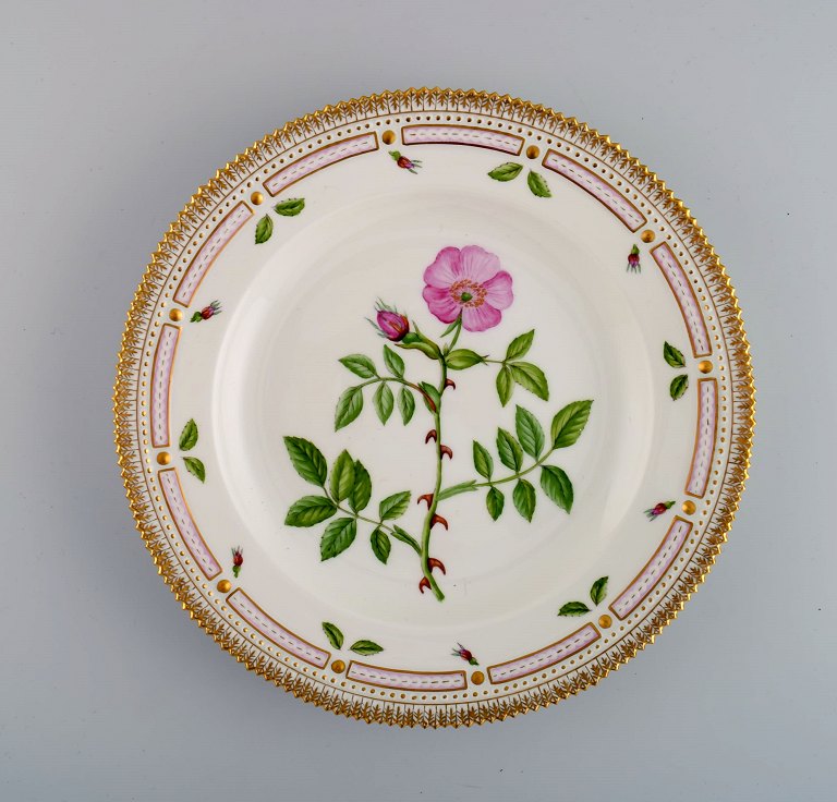 Royal Copenhagen Flora Danica dinner plate in hand-painted porcelain with 
flowers and gold decoration. Model number 20/3549.
