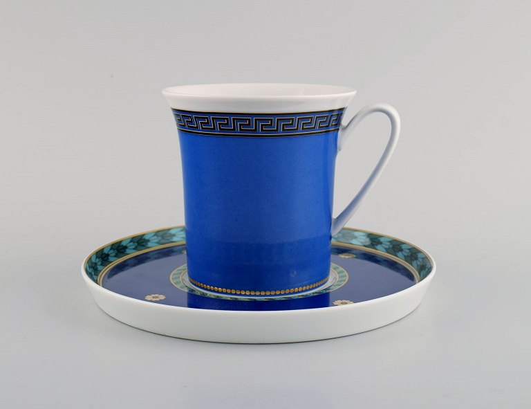 Gianni Versace for Rosenthal. Le Roi Soleil coffee cup with saucer in porcelain. 
Late 20th century.
