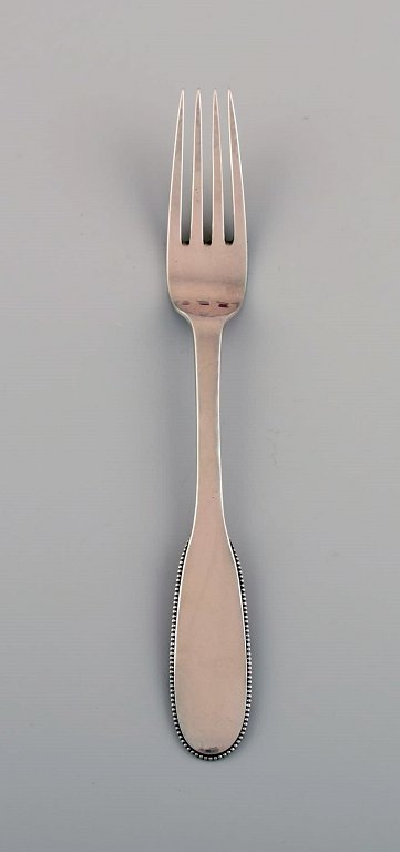 Evald Nielsen number 14 dinner fork in hammered silver (830). 1920s.
