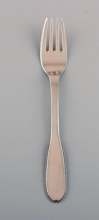 Evald Nielsen number 14 lunch fork in hammered silver (830). 1920s.
