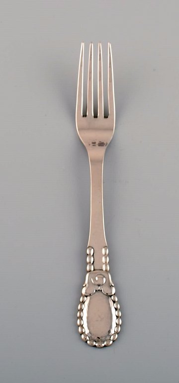 Evald Nielsen number 13 dinner fork in hammered silver (830). 1920