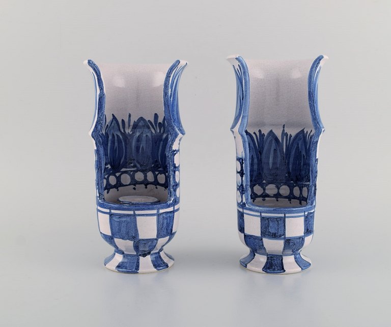 Bjørn Wiinblad (1918-2006), Denmark. Two candlesticks in hand-painted glazed 
ceramics. Dated 1970.
