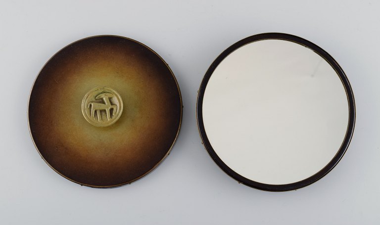Hans Bergström for Ystad Brons. A pair of art deco hand mirrors in bronze. 
1940s.
