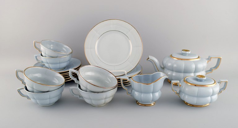 Arthur Percy for Upsala-Ekeby / Gefle. Complete art deco Grand tea service in 
pastel blue porcelain with hand-painted gold edge for six people. 1930s / 40s.
