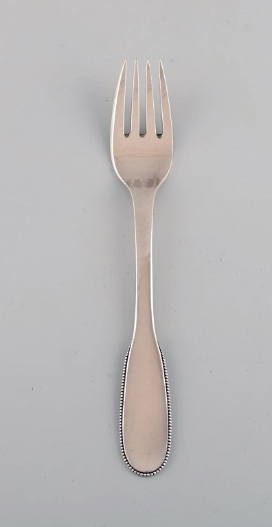 Evald Nielsen number 14 lunch fork in hammered silver (830). 1920s. 3 pcs in 
stock.
