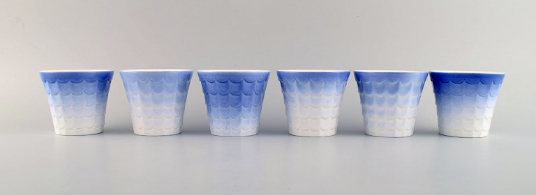 Wilhelm Kåge for Gustavsberg. Six flower pot covers in porcelain. Swedish 
design, 1960s.
