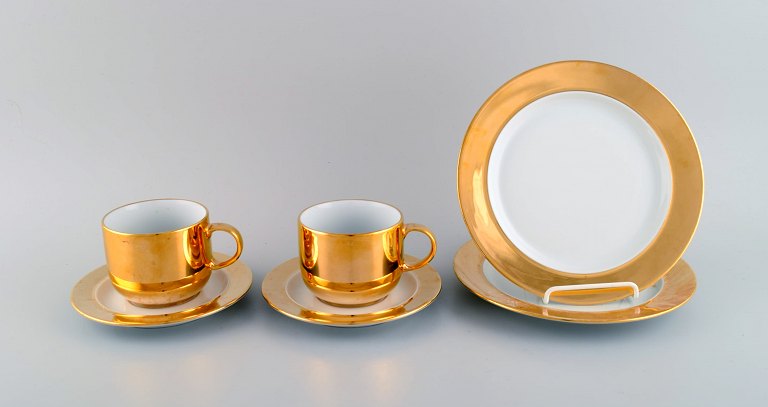 Langenthal, Switzerland. Coffee service for two people in porcelain with 
hand-painted gold decoration. 1930s / 40s.
