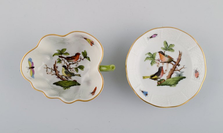 Herend Rothschild Bird. Porcelain butter pad and small bowl with handle with 
hand-painted birds, butterflies and gold decoration. Mid-20th century.
