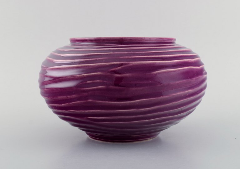 Rare Zsolnay vase in glazed ceramics. Beautiful glaze in purple shades. Mid-20th 
century.
