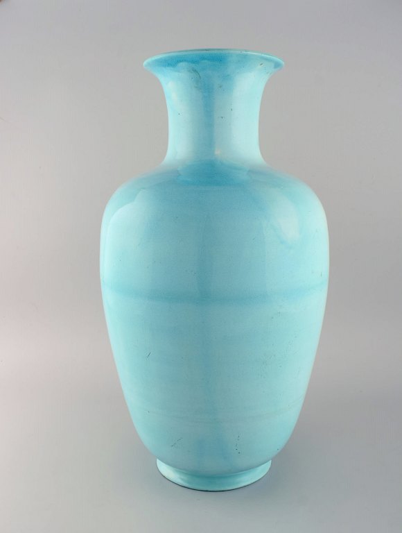 Giant antique Zsolnay floor vase in glazed ceramics. Beautiful glaze in 
turquoise shades. Dated 1891-1895.
