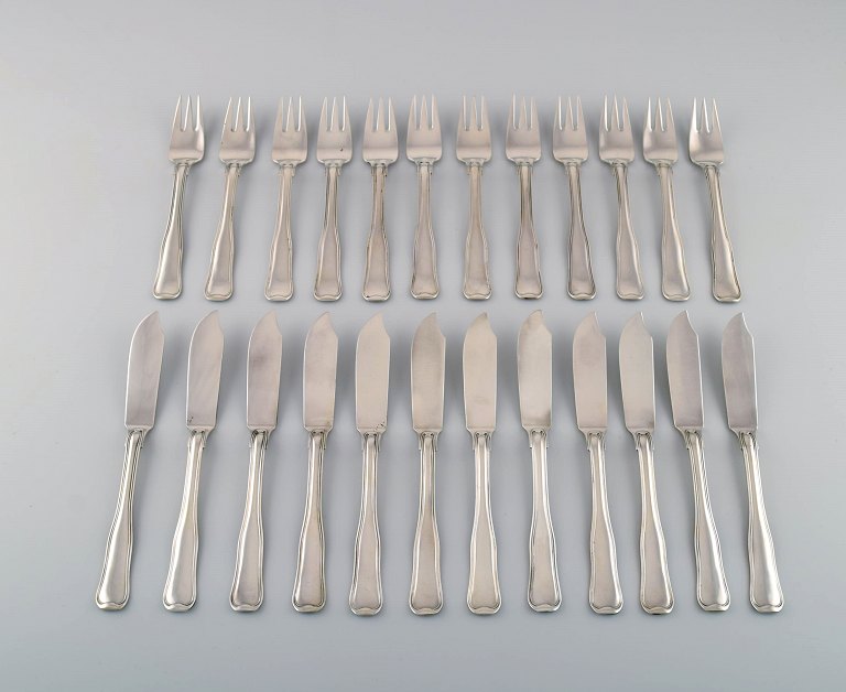 Complete Georg Jensen Old Danish fish service for twelve people in sterling 
silver.
