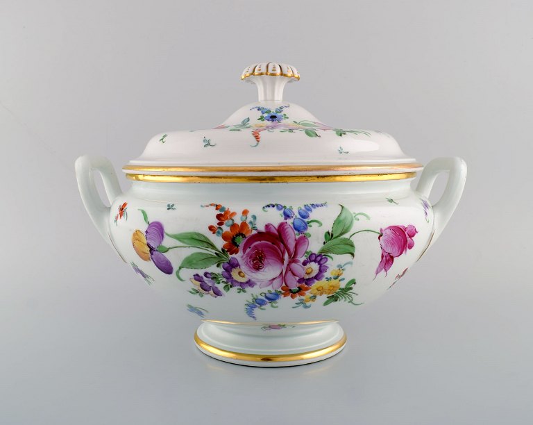 Large antique Meissen soup tureen in porcelain with hand-painted flowers and 
gold decoration. Late 19th century.
