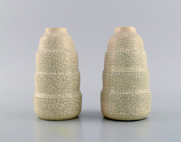 Jean Maubrou (1900-1965), France. A pair of art deco vases in glazed ceramics. 
Beautiful crackle glaze in cream shades. 1930s / 40s.
