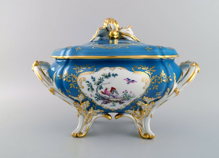 Large Limoges lidded tureen with hand-painted birds in landscape and gold 
decoration. Classic tureen in Sevres style. Dated 1960.
