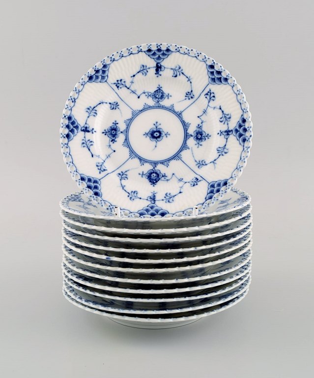 Twelve Royal Copenhagen Blue Fluted Full Lace plates in porcelain. Model number 
1/1088.
