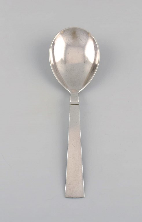 Just Andersen for Georg Jensen. Blok / Acadia serving spoon in sterling silver. 
Dated 1933-1944.
