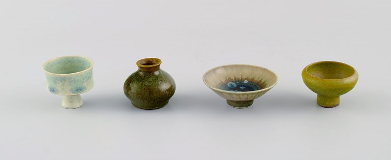 Swedish studio ceramics. Four unique miniature vases in glazed stoneware. Late 
20th century.
