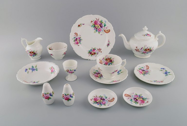 Coalport, England. Egoist breakfast / tea service in porcelain decorated with 
flowers. 1960s / 70s.
