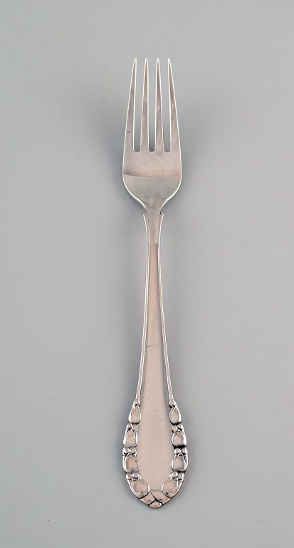 Early Georg Jensen Lily of the valley dinner fork in silver (830). Dated 
1915-1930. 15 pieces in stock.
