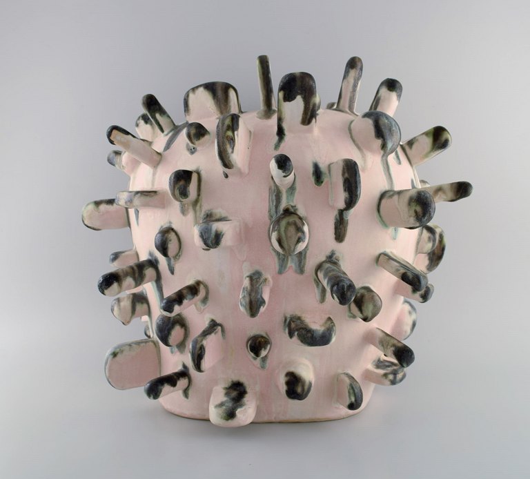 Christina Muff, Danish contemporary ceramicist (b. 1971). Very large sculptural 
unique vase in glazed stoneware. White / delicate pink glaze as base. Gray 
running glaze on all tips.
