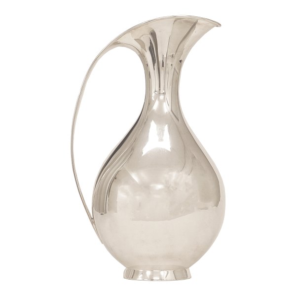 Kay Fisker silver pitcher. Kay Fisker for A. Michelsen, Copenhagen: Large 
Sterling silver pitcher 1,5L
Made 1974
H: 26,5cm. W: 776gr