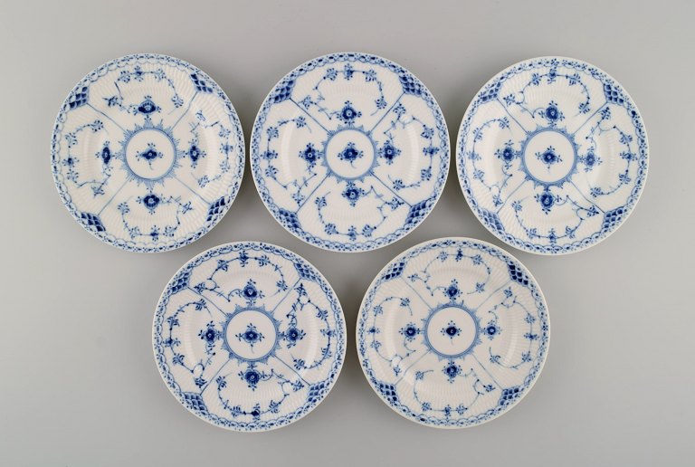 Five Royal Copenhagen Blue Fluted Half Lace Plates. Mid-20th century. Model 
number 1/574.
