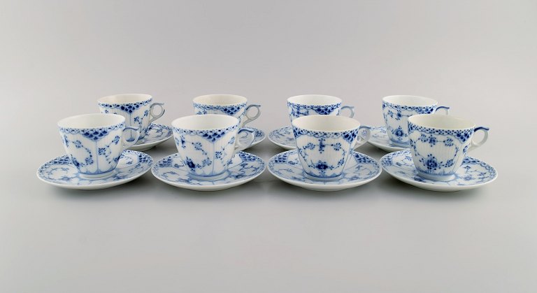 Eight Royal Copenhagen Blue Fluted Half Lace coffee cups with saucers. Model 
number 1/719.
