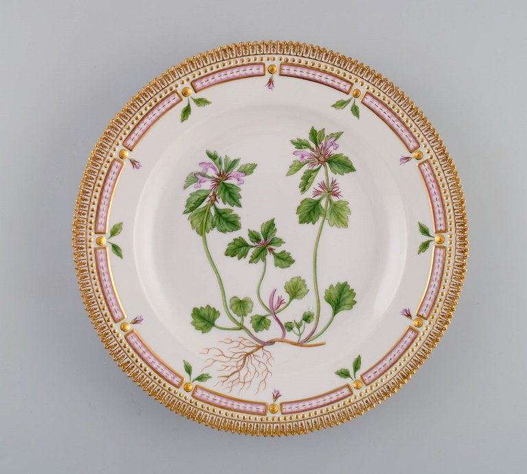 Royal Copenhagen Flora Danica dinner plate in hand-painted porcelain with 
flowers and gold decoration. Model number 20/3549.
