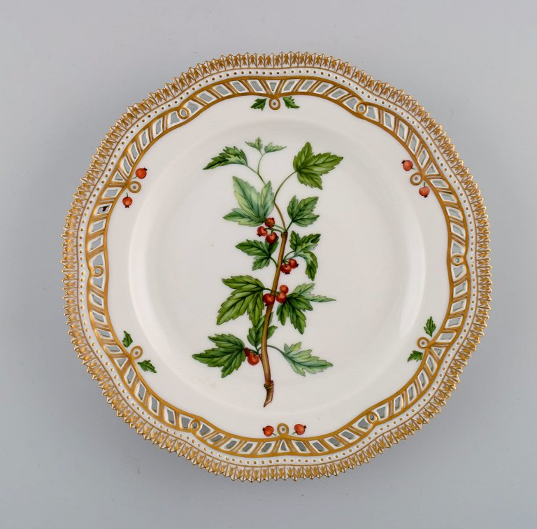 Royal Copenhagen Flora Danica openwork plate in hand-painted porcelain with 
flowers and gold decoration. Model number 20/3554.
