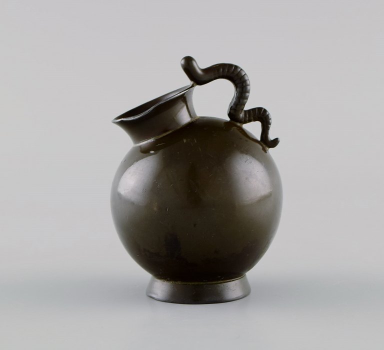 Just Andersen (1884-1943), Denmark. Early miniature vase in disko metal. Hank 
shaped like a snake. 1930s. Model number 160.
