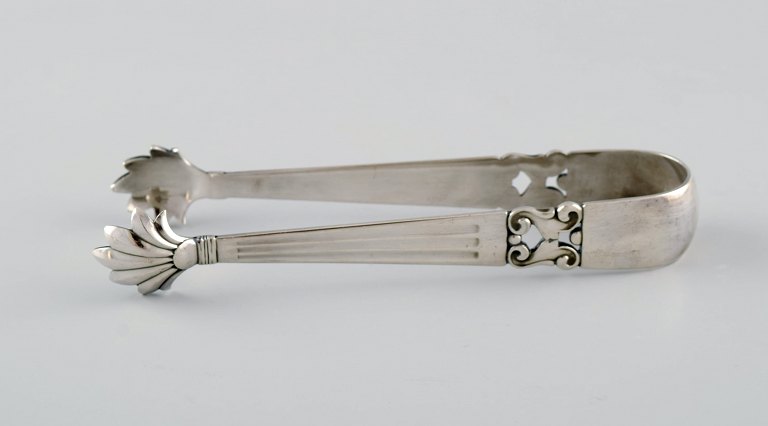 Rare Georg Jensen Acorn ice tong in sterling silver.
