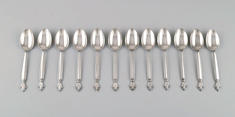 Twelve Georg Jensen Acanthus spoons in sterling silver.
