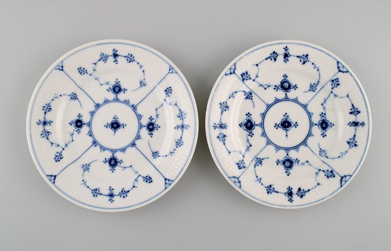 Two Royal Copenhagen Blue Fluted Plain Plates. Model number 1/180. Dated 
1889-1922.

