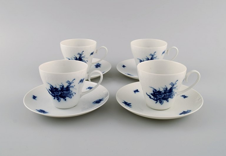 Bjørn Wiinblad for Rosenthal. Four Romanze Blue Flower coffee cups with saucers. 
1960s.
