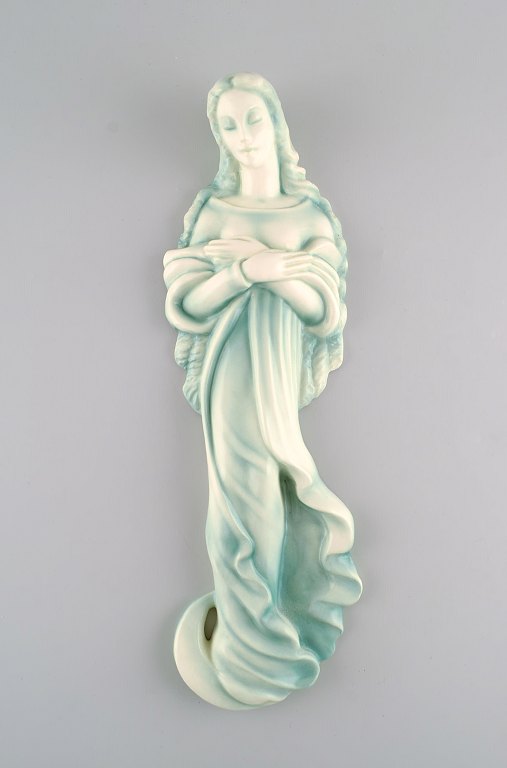 Goldscheider, Austria. Art deco wall figure in glazed ceramics. Madonna. 
Beautiful glaze in turquoise shades. 1940s.
