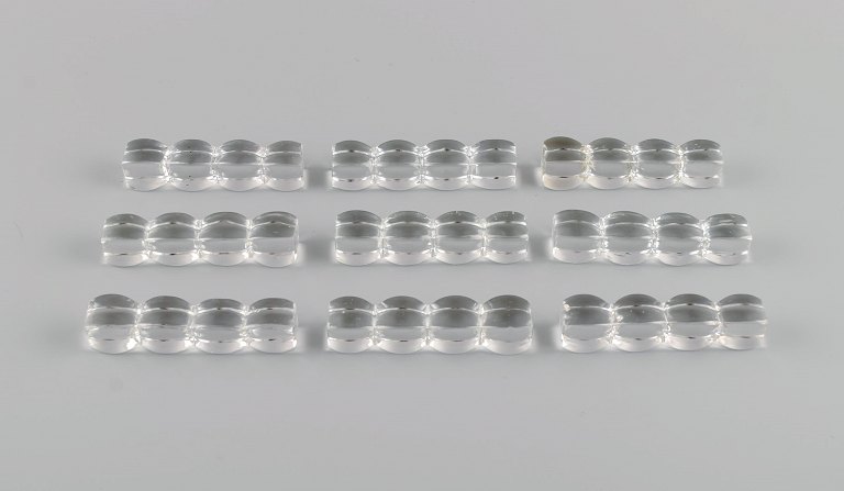 9 art deco knife rests in clear art glass. France, 1930s / 40s.
