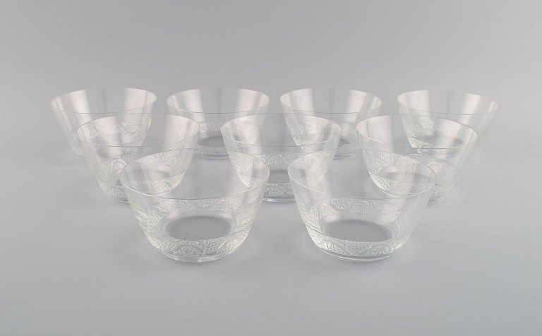 9 René Lalique Phalsbourg bowls in clear art glass with vines and grapes in 
relief. Mid-20th century.
