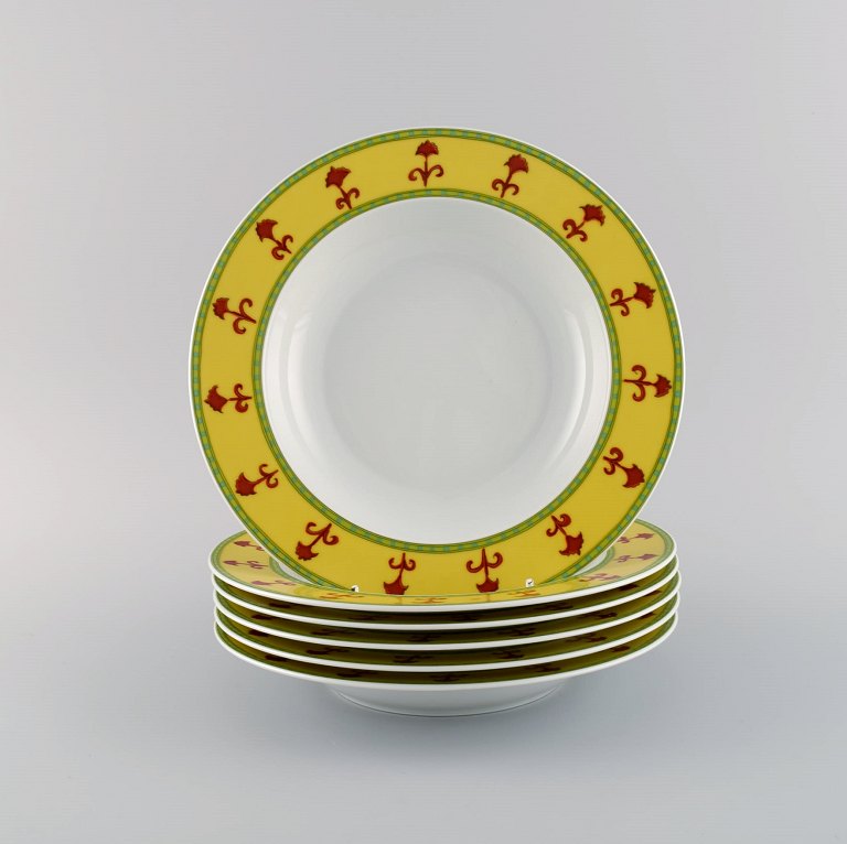 Paul Wunderlich for Rosenthal. Seks Bokhara dybe tallerkener i porcelæn. 
Farverigt design, sent 1900-tallet.
