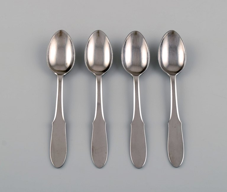 Gundorph Albertus for Georg Jensen. Four Mitra teaspoons in stainless steel. 
1970s.
