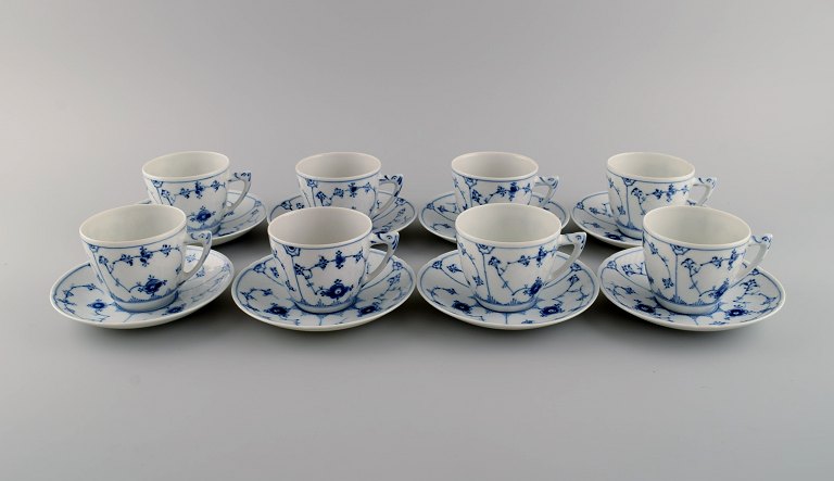 Eight Bing & Grøndahl blue fluted coffee cups with saucers. Model number 305. 
Mid 20th century.
