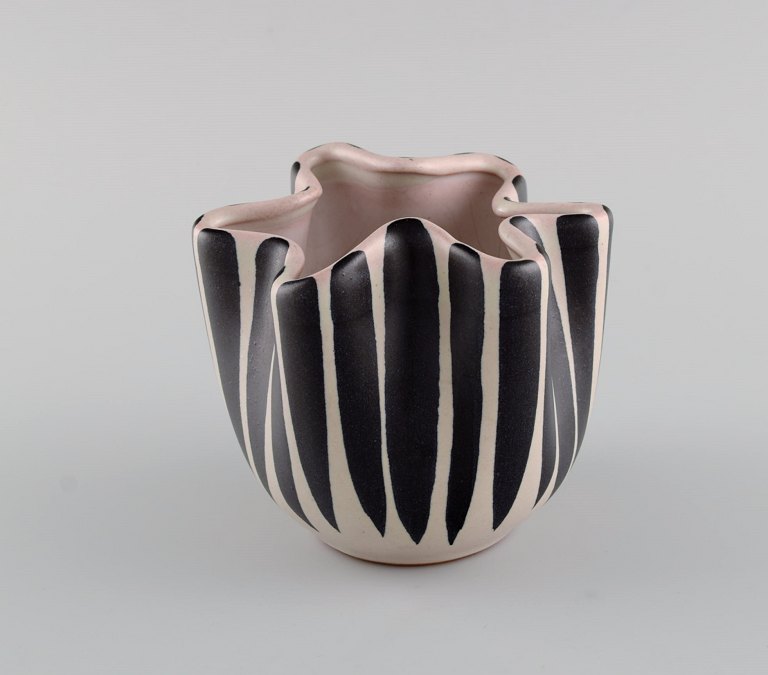 European studio ceramicist. Unique vase with wavy edge in glazed ceramics. 
Striped design, 1960s / 70s.
