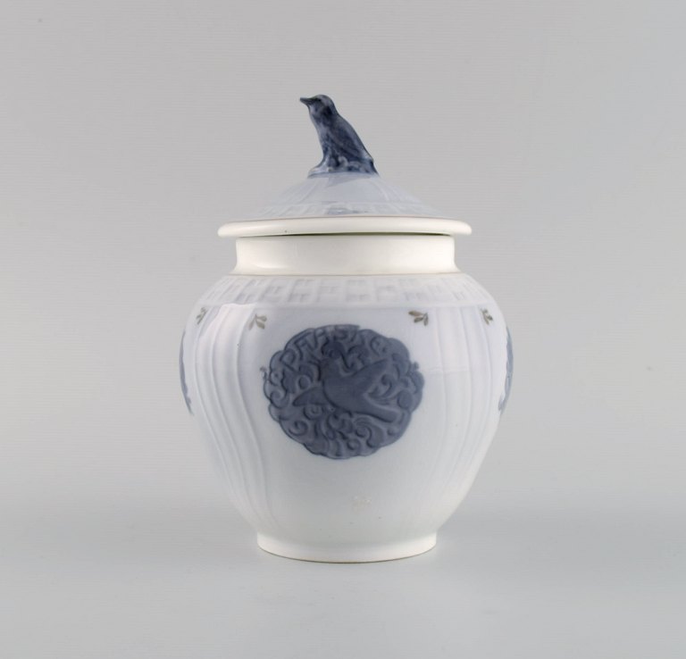 Royal Copenhagen Easter lidded jar in hand-painted porcelain. lid knob modeled 
as a bird. Dated 1919.
