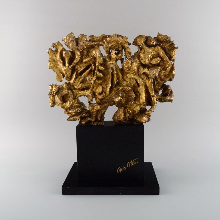 European sculptor. Large sculpture in gold decorated metal on marble plinth. 
Late 20th century.
