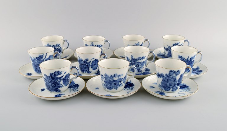 11 Royal Copenhagen Blue Flower Curved mocha cups and saucers with gold edge. 
1970s. Model number 10/1546.
