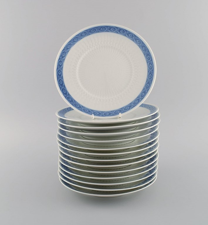 14 Royal Copenhagen Blue Fan lunch plates. 1960s / 70s. Model number 1212/11521. 
Designed by Arnold Krog in 1909.
