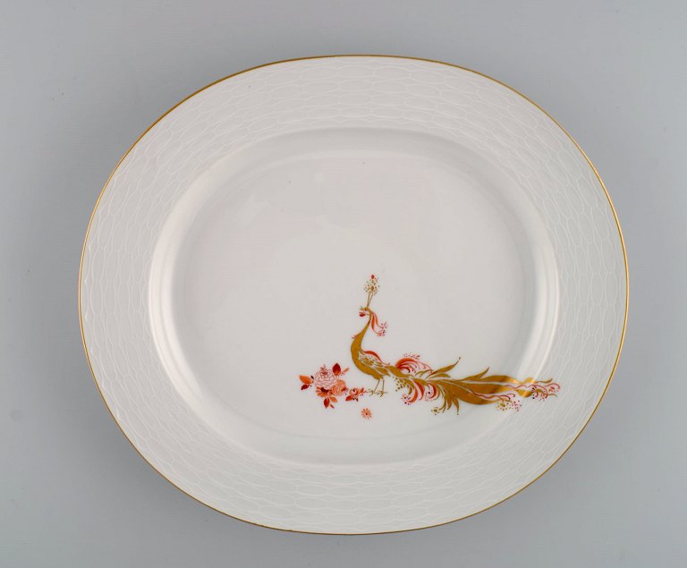Rare art deco Meissen serving dish with hand-painted peacocks and gold 
decoration. 1930s.
